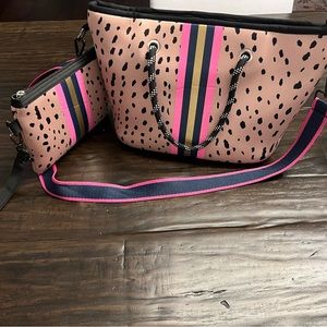 Cute bag with matching smaller bag. Interchangeable strap.